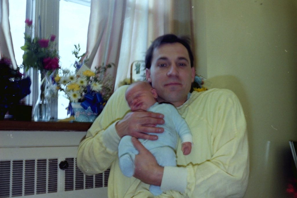 Pat harris baby photo of Pat Harris holding his baby